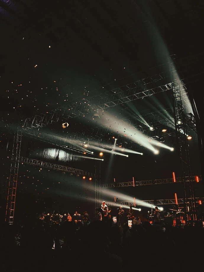 a stage with a crowd of people